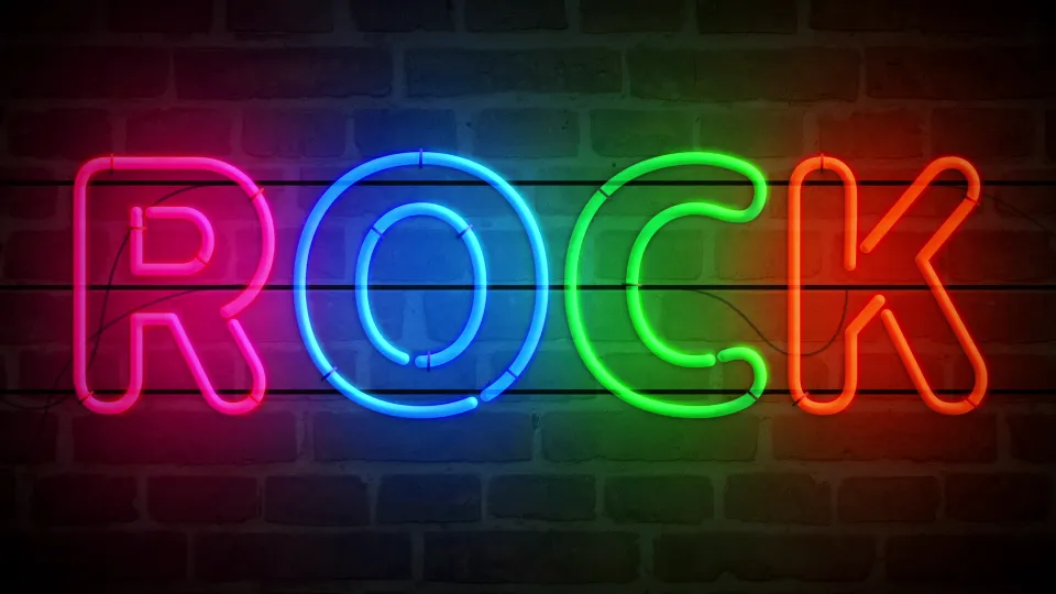 rock-music-neon-on-brick-wall-loop-2023-04-10-23-08-06-utc